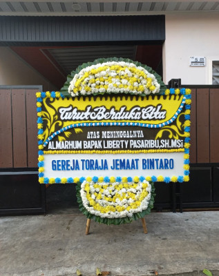 Papan Bunga Duka di Dolo Barat